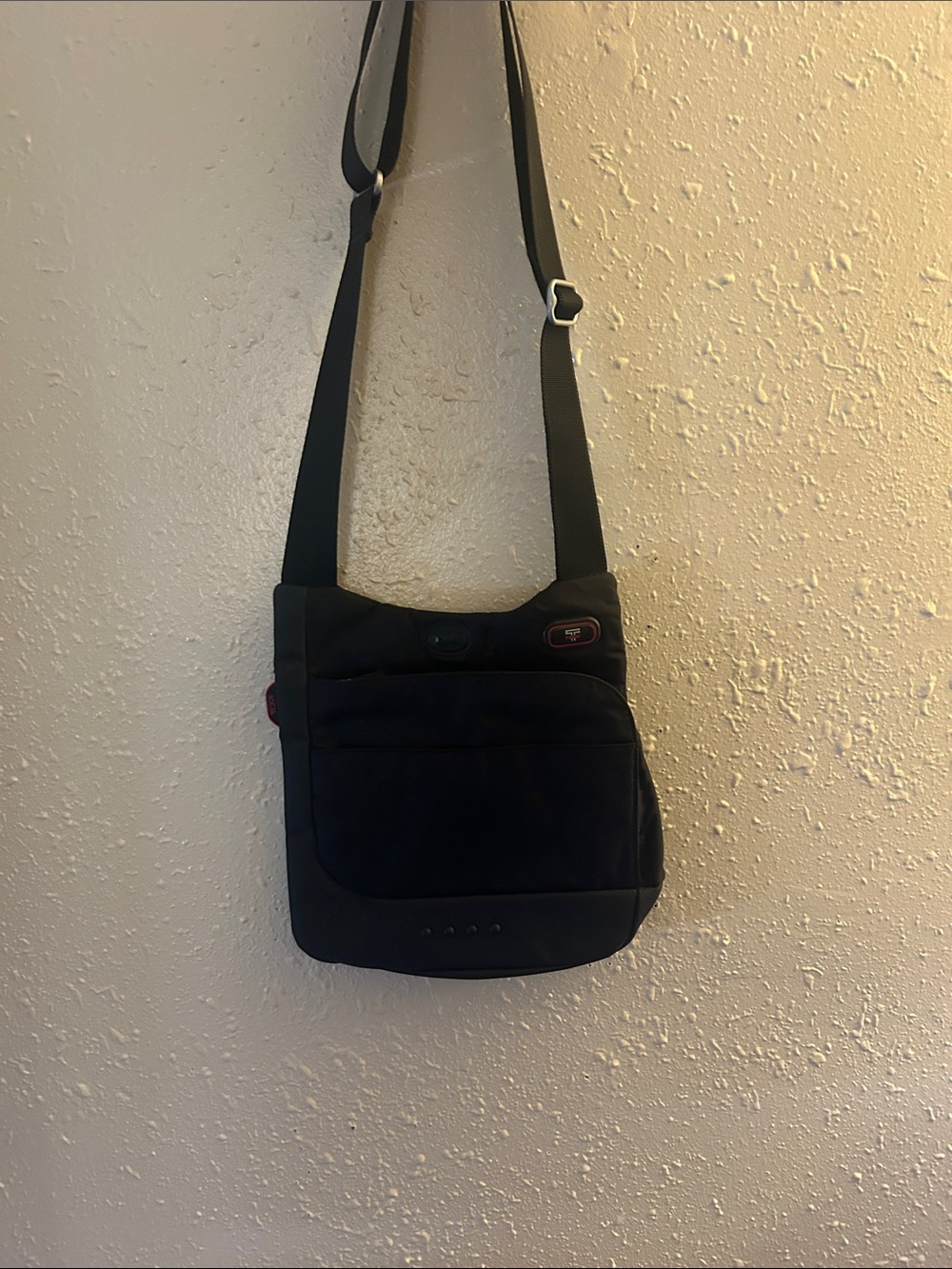 Tumi crossbody bag